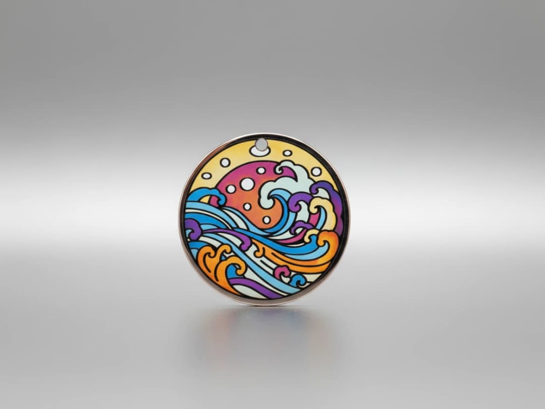 Round Pendant Depicting Waves in Color